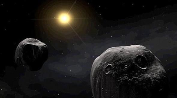 艺术家绘制的两颗小行星组成的天体系统，科学家认为这样的天体系统撞击了瑞典