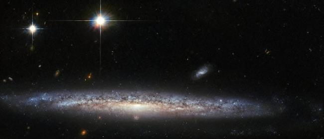 NASA发布拥有超新星的牧夫座螺旋星系NGC 5714照片