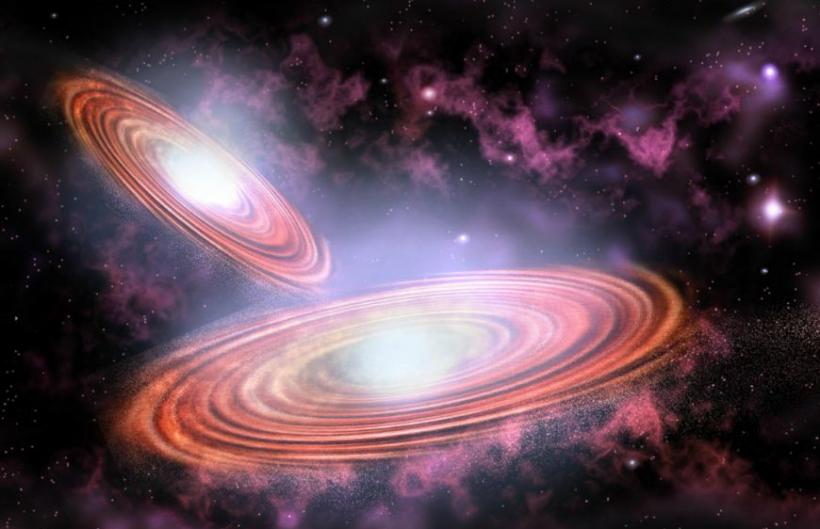 双黑洞系统PG 1302-102释放神秘周期性信号 在100万年内会发生合并