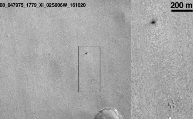 MRO拍摄的火星地面影像上，出现一个黑点。