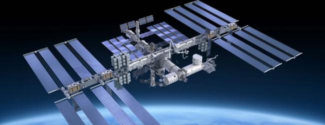 “黑影”其实是国际太空站。