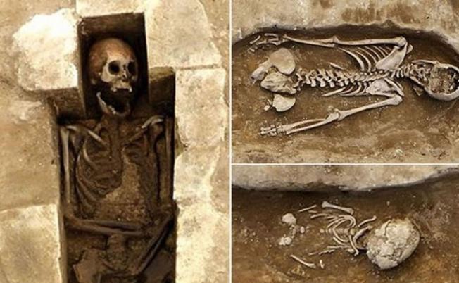 该具修女的骸骨（右上）是脸部向下，右下则是婴儿骸骨。