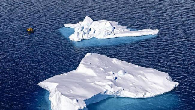 海温上升将引发骨牌效应，威胁人们生活。图为日益消融的南极冰山。图片来源：陈维沧提供。