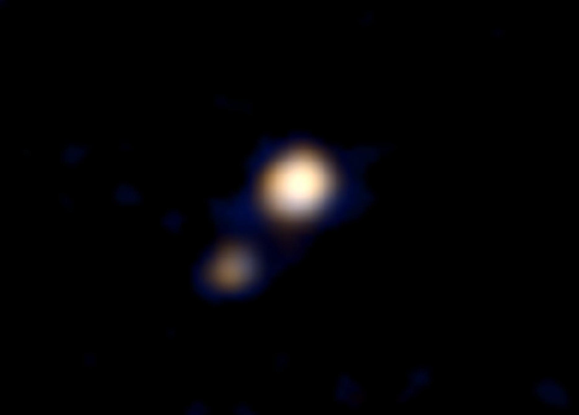 新视野号传回一张冥王星的彩色照片 NASA预计7月可以拍到冥王星表面照片