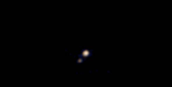 新视野号传回一张冥王星的彩色照片 NASA预计7月可以拍到冥王星表面照片