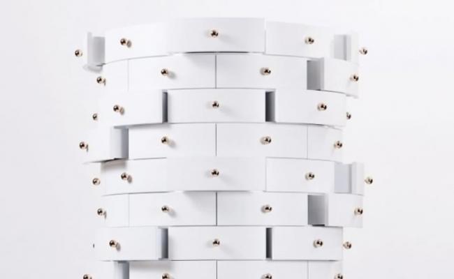 斯洛文尼亚女设计师设计出有144个小型白色抽屉的柜