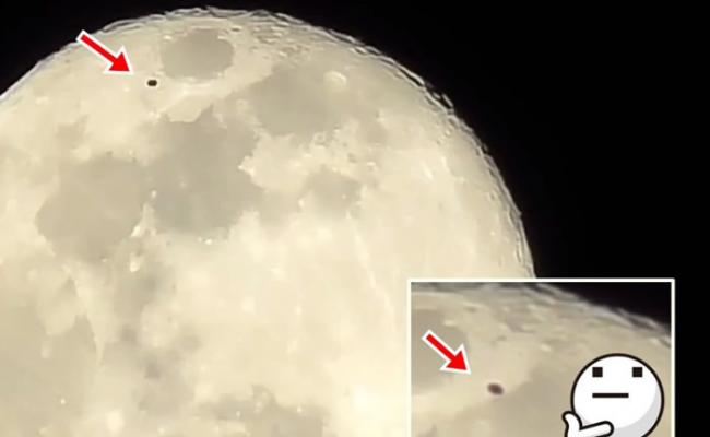 美国密歇根州底特律有人拍摄满月 赫然发现黑色碟状UFO快速飞过月球表面
