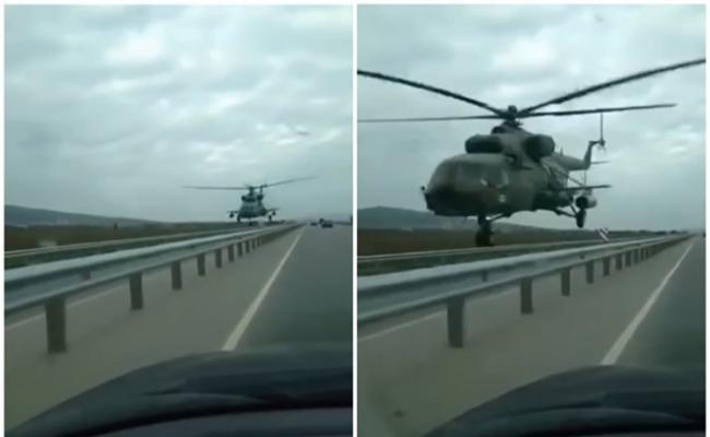 俄罗斯车臣古杰尔梅斯军用直升飞机异常低飞险与汽车相撞