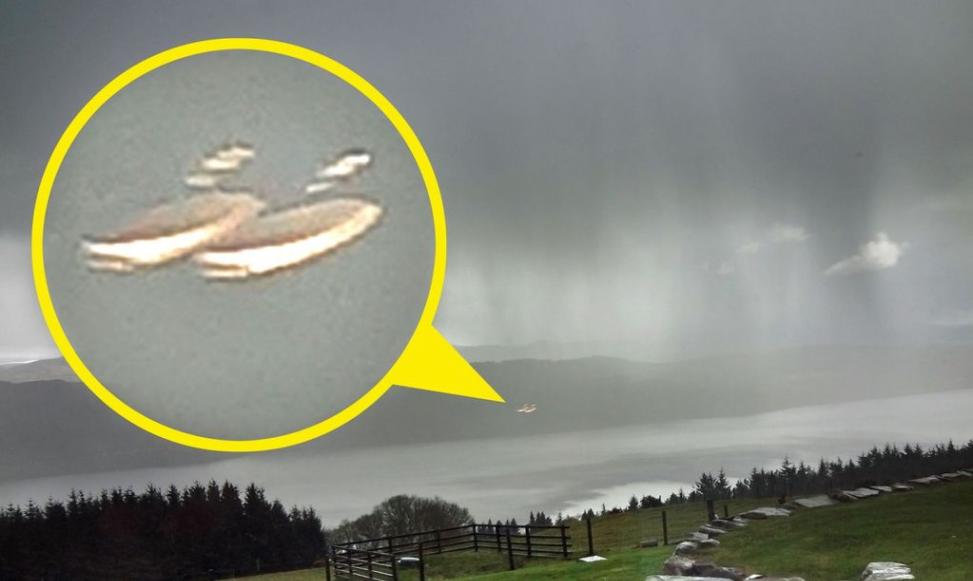 英国夫妇游尼斯湖没找到水怪却拍到湖面上盘旋的一对UFO