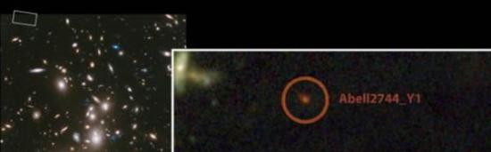美国宇航局的哈勃太空望远镜拍摄的Abell 2744星系团照片，放大区域为Abell2744_Y1星系及周边地区。Abell2744_Y1是迄今为止发现的最遥远