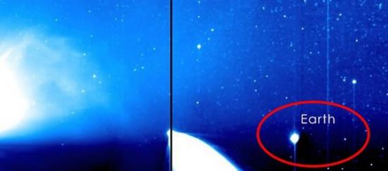 照片左边是太阳日冕物质抛射，中间是泛星彗星，右边那颗才是地球。
