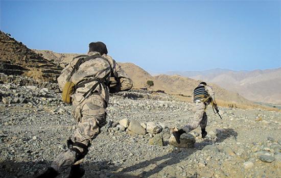 2009年6月，阿富汗政府军在甘加尔谷地与塔利班作战的情景