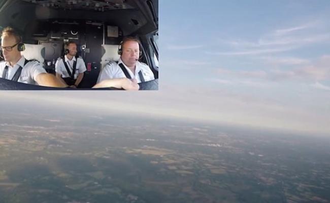 飞机升空后，机组人员可以从驾驶舱看到伦敦郊区的田园景色。