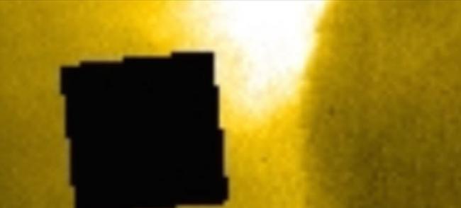 NASA太阳照疑现神秘黑方块
