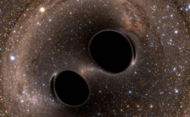 LIGO的科学家侦测到两个黑洞碰撞所发出的引力波。