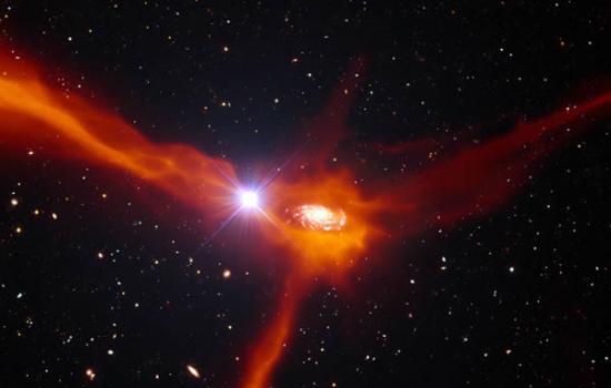 背景星系的热产生的光使得科学家能够探索星系是如何自我供给的。在这张艺术家印象图里，气体穿过星际介质到达星系中央。