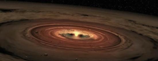 美国宇航局斯皮策太空望远镜观测到的褐矮星的艺术家概念图，这颗恒星是由旋转的原行星盘环绕。美国加州大学伯克利分校的研究学者研发了一种新模型，显示了旋涡是如何导致原