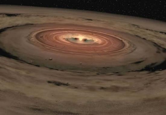 一颗棕矮星周围围绕着形成行星的盘状物质。棕矮星质量不足，不能引发核聚变，变成恒星。研究人员说，它们周围可能运行着支持生命生存的岩态外行星。