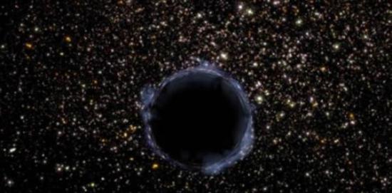 太空专家大卫-格伦表示宇宙是一个神秘的所在，存在我们未知的巨型结构，它们就像是巨型真空吸尘器，将星系吸向自己，导致宇宙发生倾斜。图像展示了一个黑洞。黑洞拥有不可