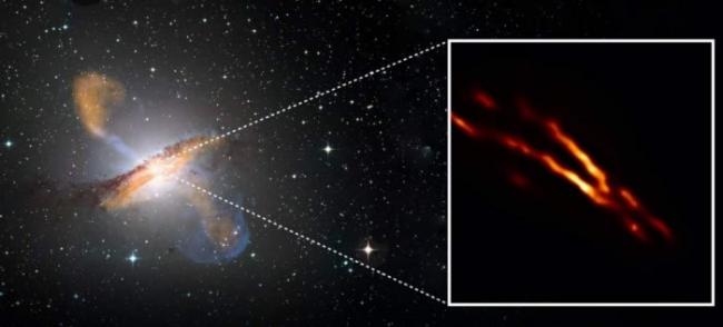 一个史无前例的超大质量黑洞及其巨大的银河系外射电喷流的图像被首次捕获